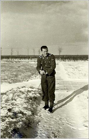SS non-commissioned officer throwing a snowball at Westerbork